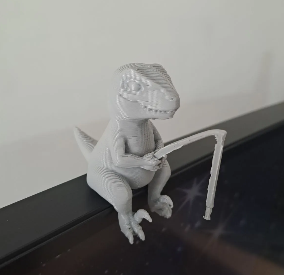 Dinosaur Monitor Buddy – Fishing Desk Companion